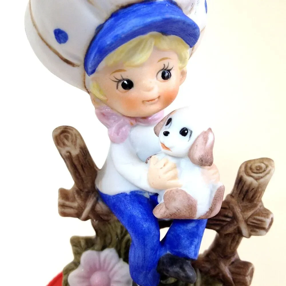Kelvin Child on Fence Rail with Puppy Porcelain Knick knack